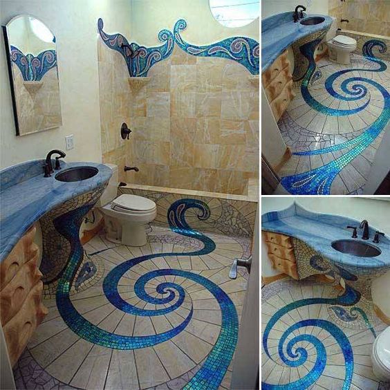 Banheiro com desenho de caracol no chão feito com pastilha.