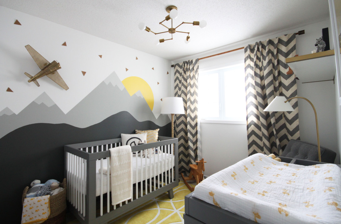 quarto de bebê menino com papel de parde de montanhas cinza e branco