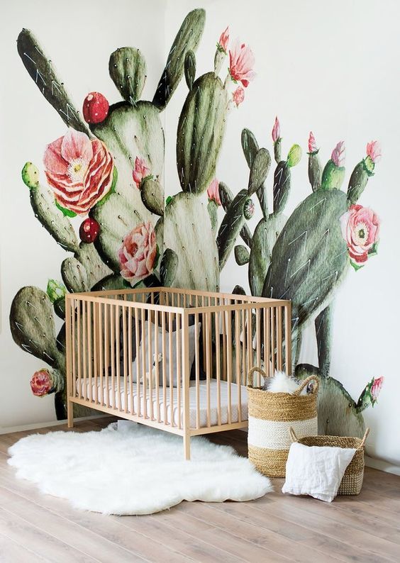quarto de bebê menina com papel de parede cactus