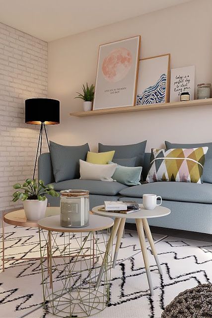 sala de estar moderna com sofá cinza 