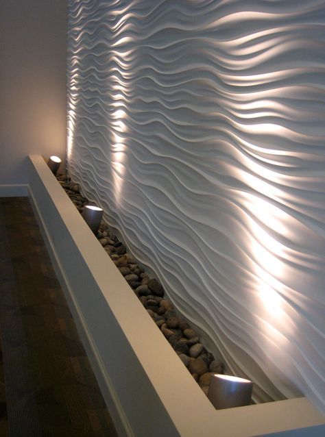paredes com textura em gesso e iluminação